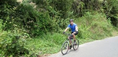 Allan Meek Cycling on the  tour with redspokes